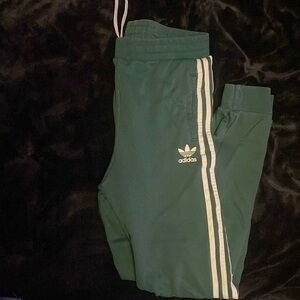 green and white Adidas joggers !